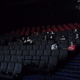 People at a movie theater wearing face masks in Prague, Czech Republic.